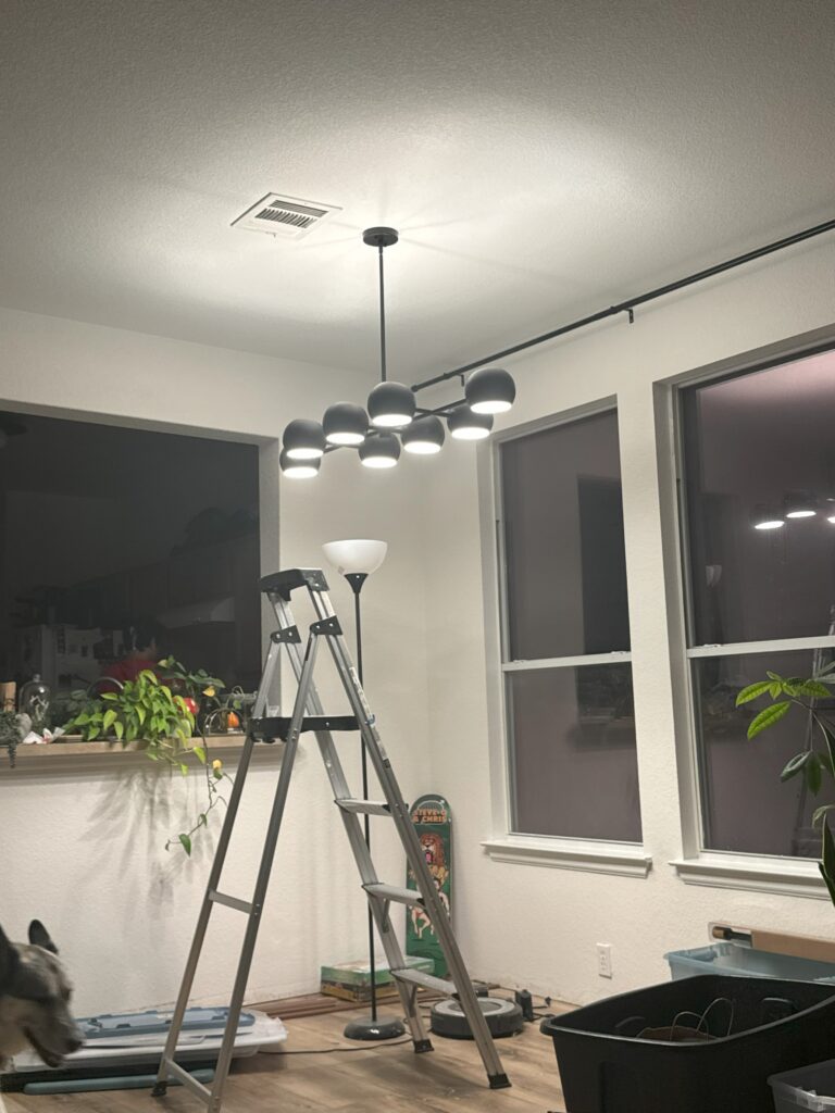 4 months in - Paint? A beautiful white... Dining light? New and installed.